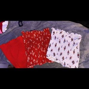 a group of 3 tube tops